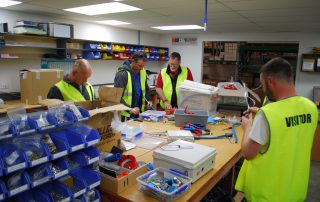 Peter and students learning about installation