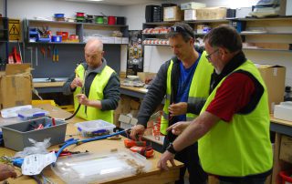 Peter Lind instructing at the work bench